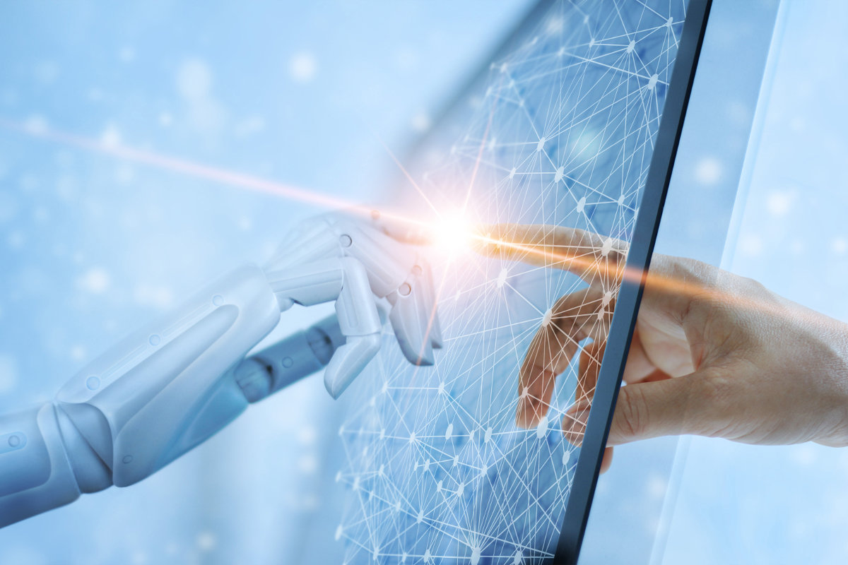 Man and robot touching hands