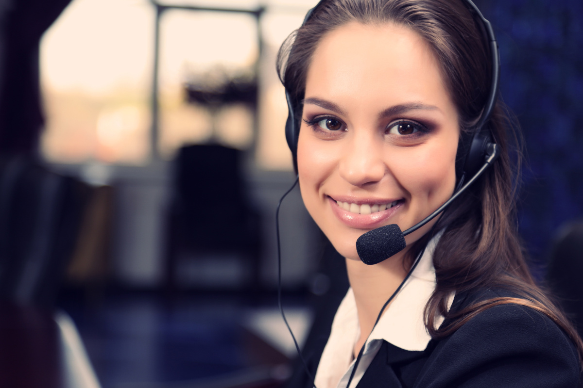 Woman in call center wearing headset