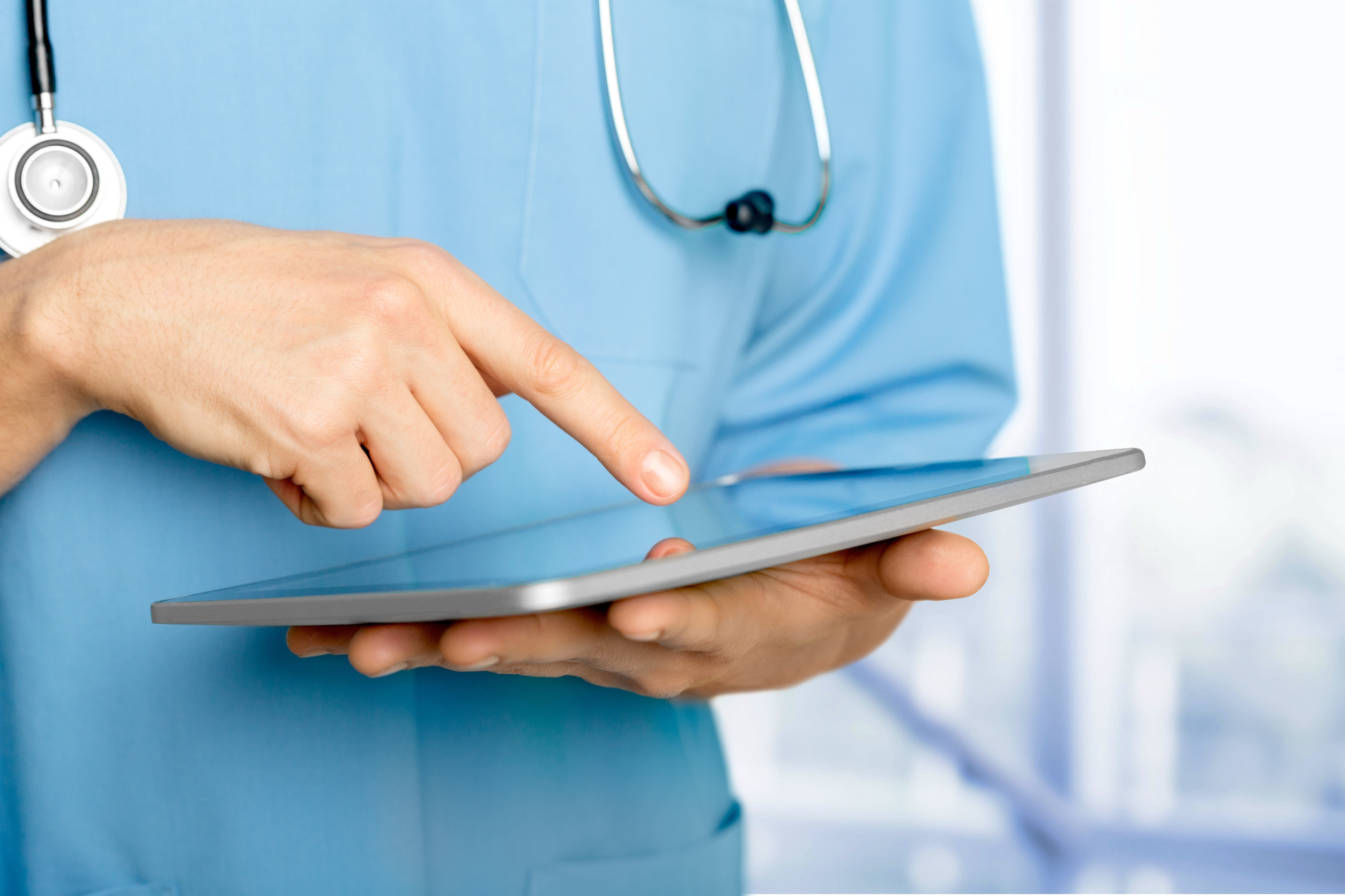 Doctor using mobile device