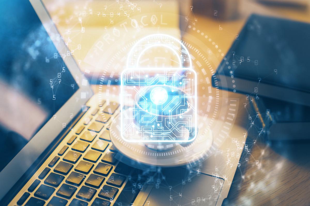 Digital Cybersecurity padlock on laptop